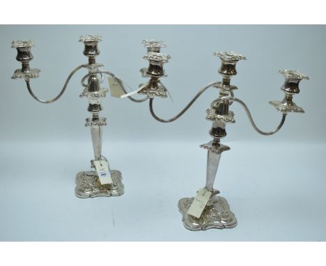 A pair of EPNS three-light twin-branch candelabra.
