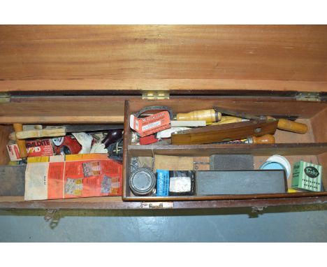 A vintage level by J. Rabone &amp; Sons; woodworking tools; etc., in vintage toolbox.