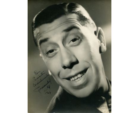 FERNANDEL: (1903-1971) French comedy Actor. A good vintage signed and inscribed 7 x 9.5 (17.5cm x 23,5cm) photograph by Ferna