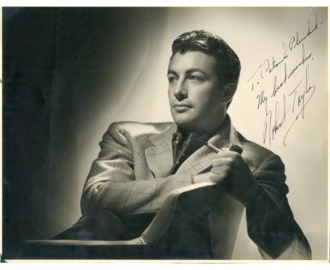 TAYLOR ROBERT: (1911-1969) American Actor. An excellent vintage signed and inscribed 13 x 10 photograph of Taylor in a half-l