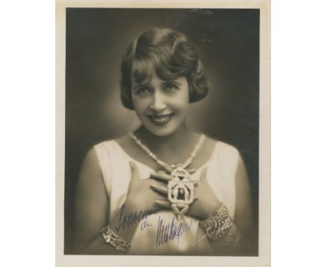 MISTINGUETT: (1875-1956) French Actress &amp; Singer. A good vintage signed 9.5 x 12 (24cm x 30cm) photograph of Mistinguett,