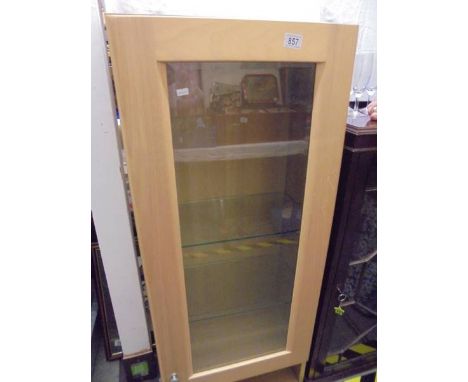 A light wood display cabinet. COLLECT ONLY.