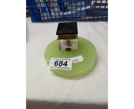A vintage onyx and glass inkwell.