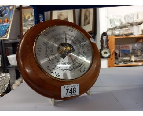 An aneroid barometer.