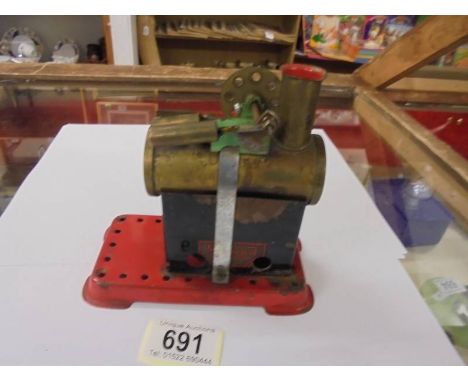 A Mamod stationary steam engine.