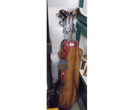 A vintage golf bag with clubs, COLLECT ONLY.