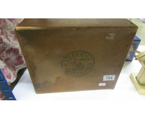 A vintage Selfridges box.