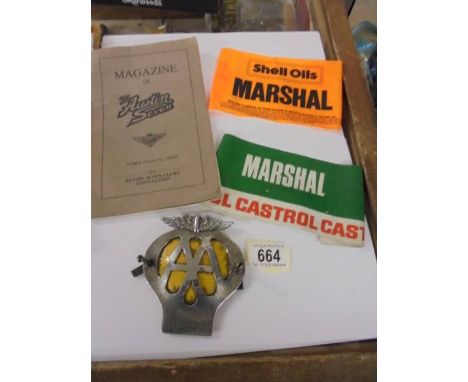 A vintage Shell Oils and Castrol Rally Marshall armbands, an AA car badge and a Austin 7 club magazine.