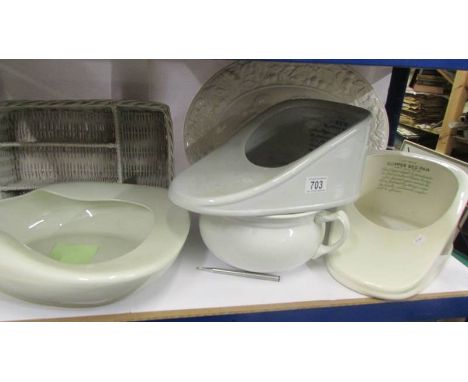 Three ceramic bed pans, a chamber pot, meat platter etc.,