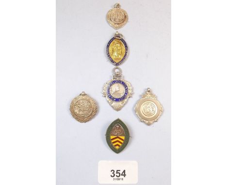 Six various silver and silver enamel medals, 65g