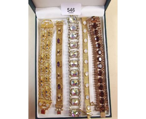 Five vintage gilt metal 'jewelled' bracelets