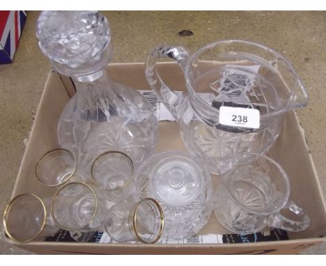 A cut glass decanter, a cut glass jug and other glassware