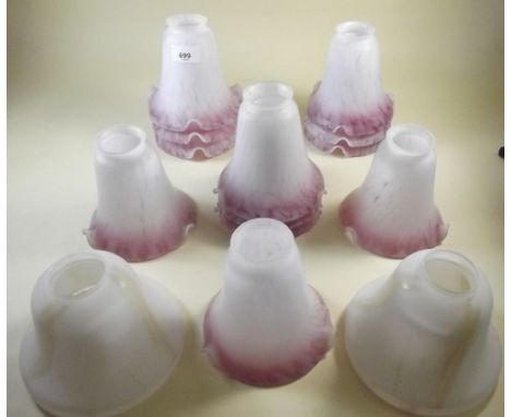 Twelve pink glass frilled edge lamp shades