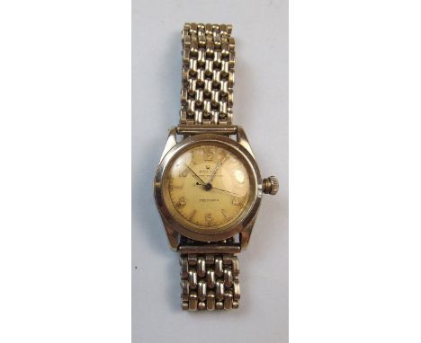 A vintage Rolex Oyster Speedking Stainless steel cased wrist watch with original guarantee dated 1947, No 503325