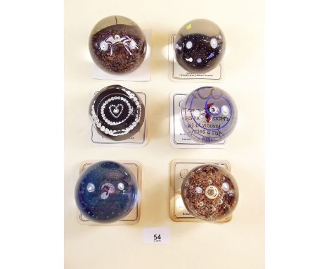 A collection of six Caithness glass paperweights: 'Pirouette', 'Helter Skelter', 'Persephone', 'Jester', 'Enigma' and 'Heart'