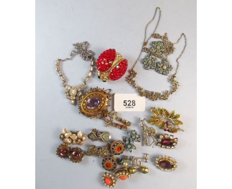 A box of antique and vintage costume jewellery