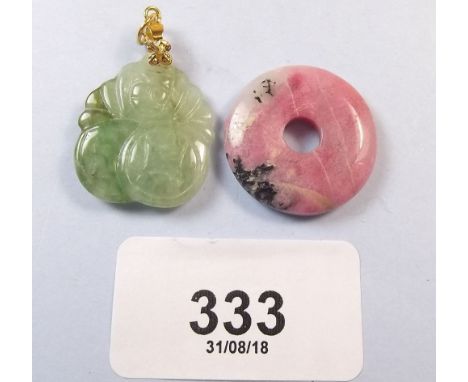 A Chinese carved jade pendant 2 x 2.5cm and a pink jade circular pendant