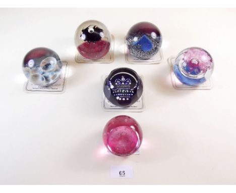 Six Caithness glass paperweights: 'Baubles, Bangle and Beads', 'Moonscape', 'Ice Flame', Queen Elizabeth 40th Anniversary, Ro