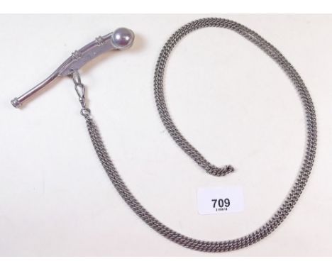A vintage naval bosuns whistle with mark