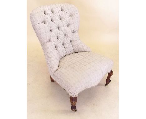A Victorian cream upholstered button back chair