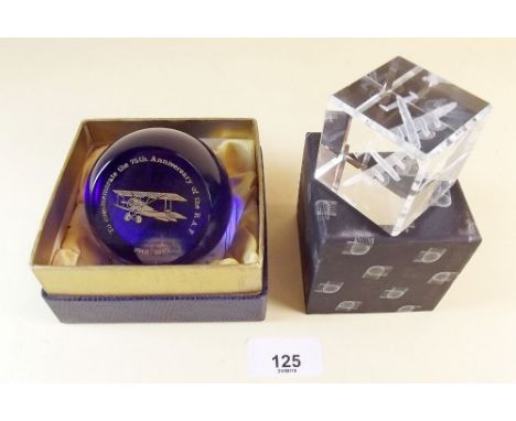 A Caithness 1993 RAF 75th Anniversary paperweight and a Lancaster plane paperweight