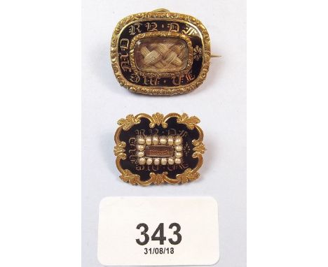Two Victorian yellow metal and black enamel mourning brooches
