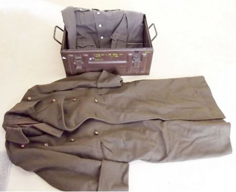 An East German jacket and a WWII great coat with ammunition tin trunk