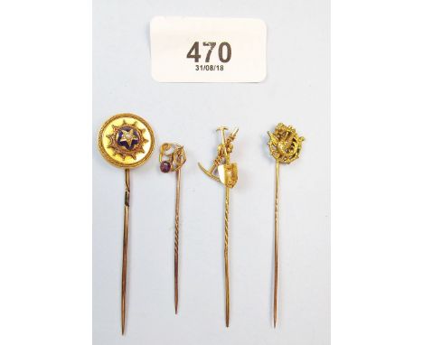 Four various yellow metal and gold stick pins