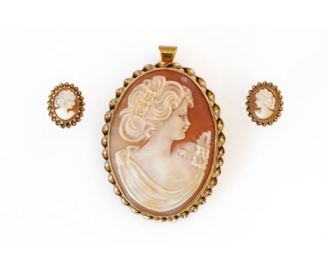 A 9CT GOLD MOUNTED OVAL SHELL CAMEO PENDANT BROOCH AND A PAIR OF EARSTUDS (3)Carved as the portrait of a lady, within a ribbo