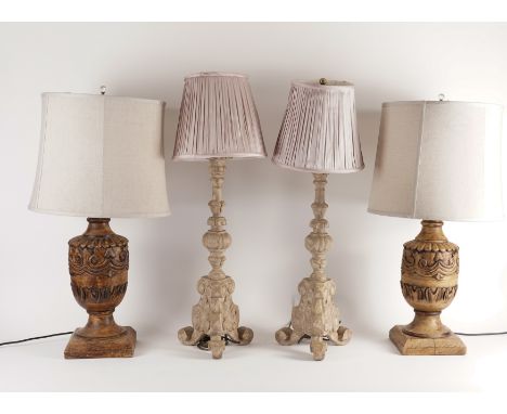 A PAIR OF CARVED HARDWOOD TABLE LAMPS AND A PAIR OF ALTAR CANDLESTICK FORM LAMPS (4)Modern
The carved ovoid lamps with linen 