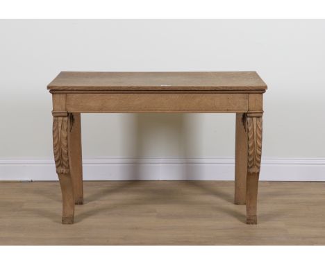 A VICTORIAN OAK SINGLE DRAWER CONSOLE TABLEOn acanthus mounted sabre supports, 114cm wide; 49cm deep; 80cm high