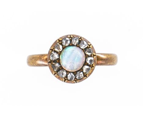 AN OPAL AND DIAMOND CLUSTER RING (2)With central round cabochon opal measuring 5.4mm in diameter, surrounded by claw set rose