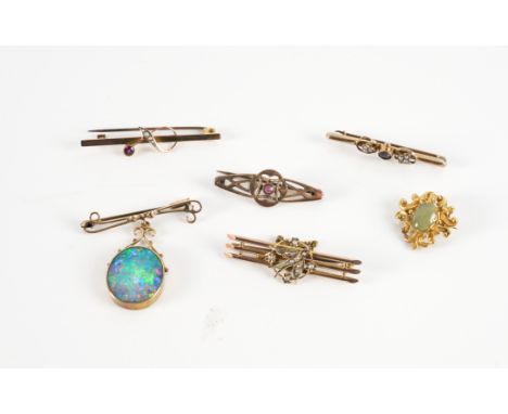SIX BROOCHES (6)Comprising; a gold and seed pearl brooch, in a triple bar design, with a bird and floral motifs at the centre