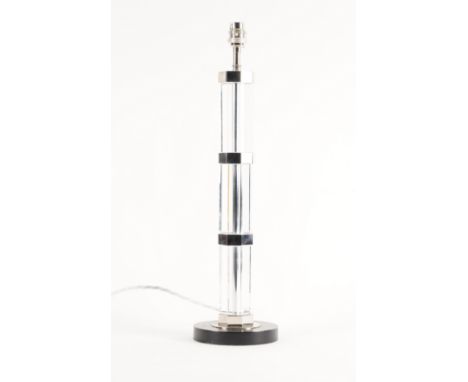 PROBABLY BY VAUGHAN: A GLASS AND CHROME TABLE LAMPModern
The octagonal stem with chrome mounts, with circular black base, 43.