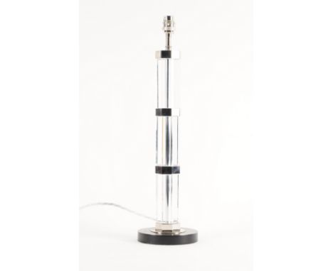 PROBABLY BY VAUGHAN: A GLASS AND CHROME TABLE LAMPModern
The octagonal stem with chrome mounts, with circular black base, 43.