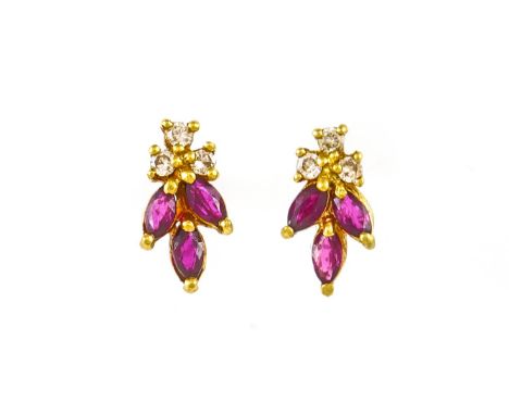 A PAIR OF 18 CT GOLD, RUBY AND DIAMOND EARSTUDSEach claw set with three marquise shaped rubies and with three circular cut di