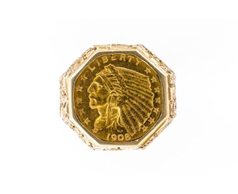 A GOLD COIN RINGMounted with a U.S.A gold two and a half dollars, 1908, the octagonal bezel with bark textured decoration, de