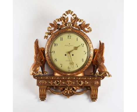 A SWEDISH GILTWOOD NEO-CLASSICAL CARTEL CLOCKLate 20th Century 
The enamel dial inscribed Rob. Engstrom Stockholm, with ribbo