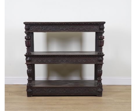 A 17TH CENTURY CARVED OAK THREE TIER BUFFETWith two frieze drawers, 127cm wide; 43cm deep; 120cm high17th century upright col