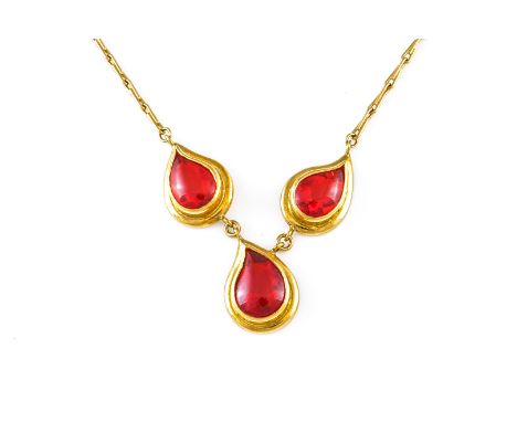 A GOLD AND FIRE OPAL PENDANT NECKLACEComprising of three drop-shaped pendants set with semi-faceted fire opals to a bar-link 