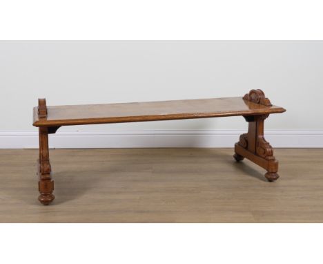 AFTER WILLIAM KENT; A POLLARD OAK BENCHOn carved silhouette trestle supports; 153cm wide; 57cm deep; 58cm highProvenance: The