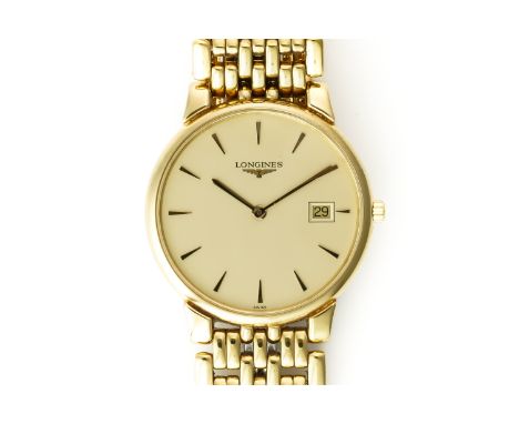 A LONGINES STEEL AND GILT METAL GENTLEMAN'S BRACELET WRISTWATCHThe signed gilt dial with gilt arrow form hour markers, gilt h