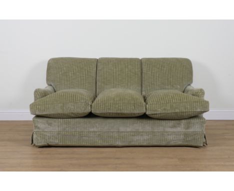 HOWARD CHAIRS LTD; AN UPHOLSTERED THREE-SEAT SOFA185cm wide; 85cm highGood overall condition solid frame, upholstery is in us