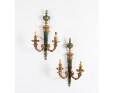 A SET OF FOUR LOUIS XVI STYLE GILT-METAL AND GREEN PAINTED TWIN-LIGHT WALL APPLIQUES (4)20th Century  With urn finials and ta