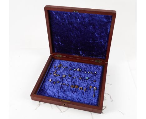 A COLLECTION OF THIRTY-FOUR VICTORIAN AND LATER STICK PINS (35)To include a gold and seed pearl pin designed as a sword, deta