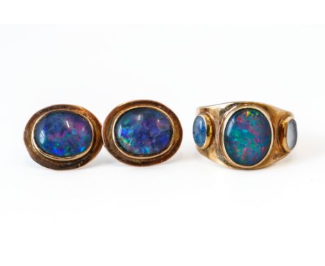 A 9CT GOLD AND OPAL TRIPLET RING AND A PAIR OF EARSTUDS (3)The ring mounted with three oval opal triplets, ring size L½ and a