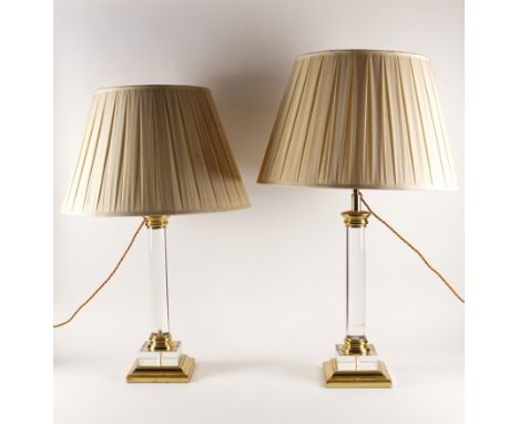 A SET OF FOUR PERSPEX AND GILT-METAL TABLE LAMPS (4)Modern
Each columnar lamp on square stepped base, fitted for electricity,