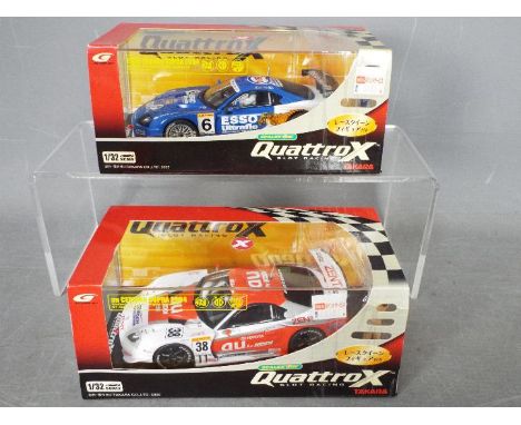 Scalextric - Takara - 2 x Toyota Supra slot cars from the Quattro X range # QX05, # QX06. Both models appear Mint in Very Goo