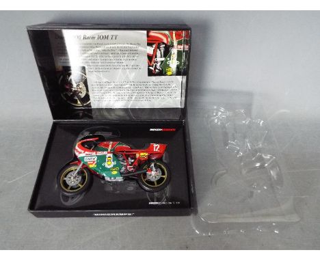 Minichamps - A 1:12 scale Ducati 900 1978 Isle Of Man TT bike, the windscreen is missing and there is some glue residue aroun