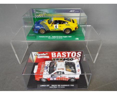 Fly - Flyslot - Lancia 037 and Porsche 911 SC slot cars # 046303, # 99089. The Lancia is a numbered limited edition. Both mod